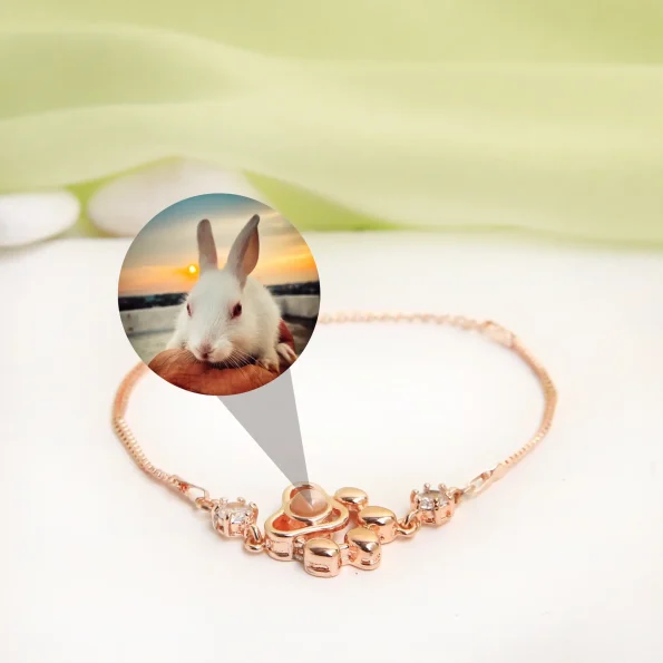 Rose gold pet paw charm bracelet, a perfect tribute to the cherished bond with your furry friend.