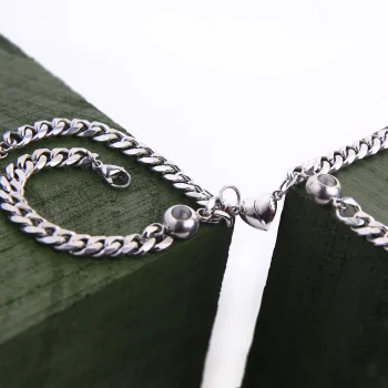 Set of 2 silver Cuban photo bracelets with a hidden image, a stylish and sentimental keepsake for treasured memories.
