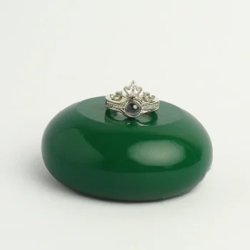 Elegant silver crown photo ring with a hidden picture inside, a meaningful keepsake for treasured moments.