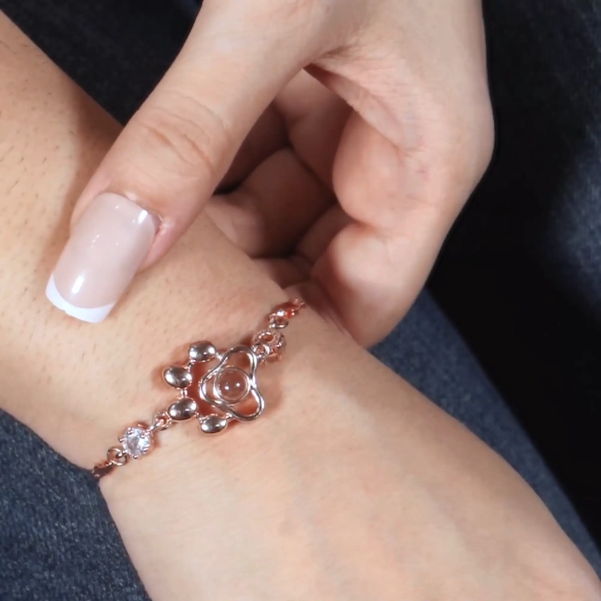 the paw charm bracelet poster