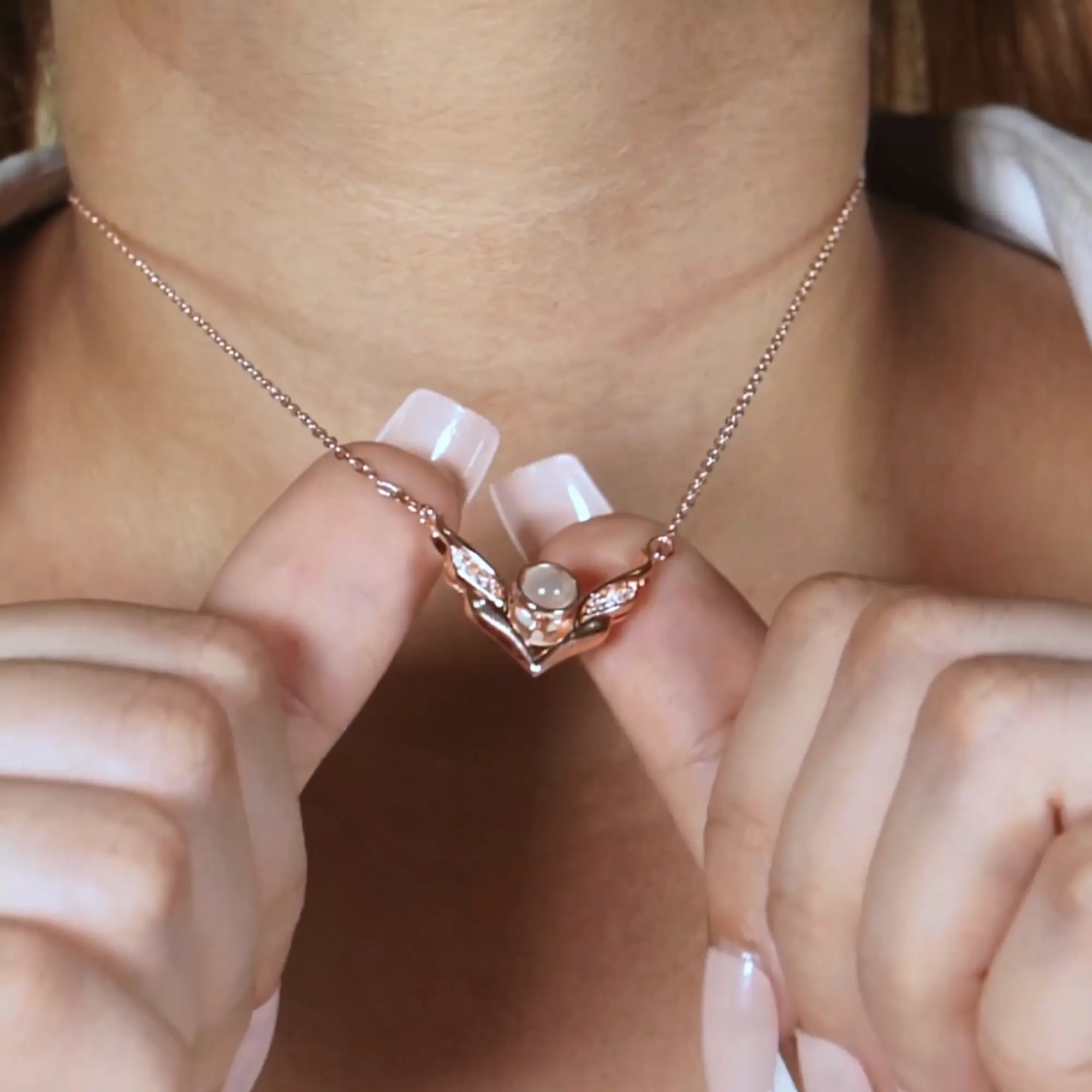 the wings necklace video