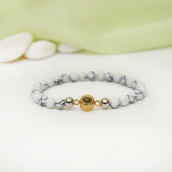 Elegant white frosted photo bracelet holding a hidden memory, perfect for meaningful connections.