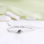 cream rope projection bracelet close-up sentimental jewelry