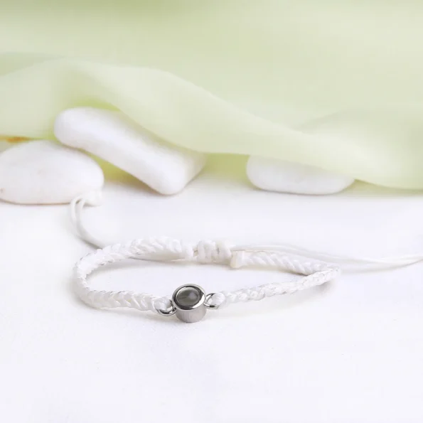 Elegant white rope projection bracelet featuring a hidden image, perfect for preserving cherished moments.